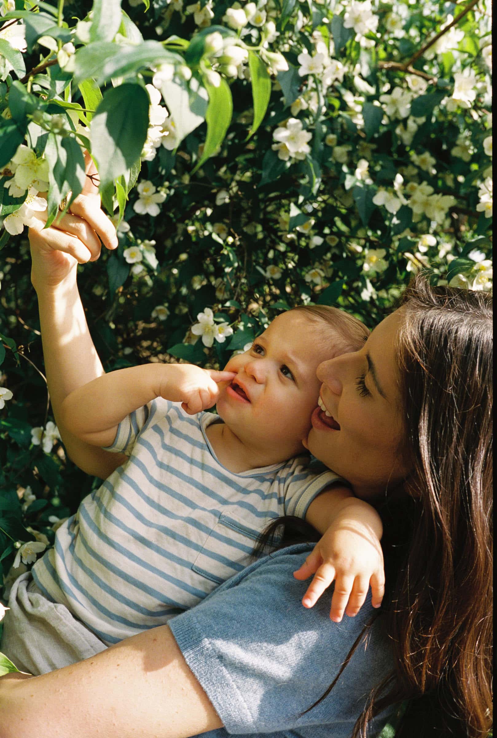 Mother and son looking at flowers in Central Park